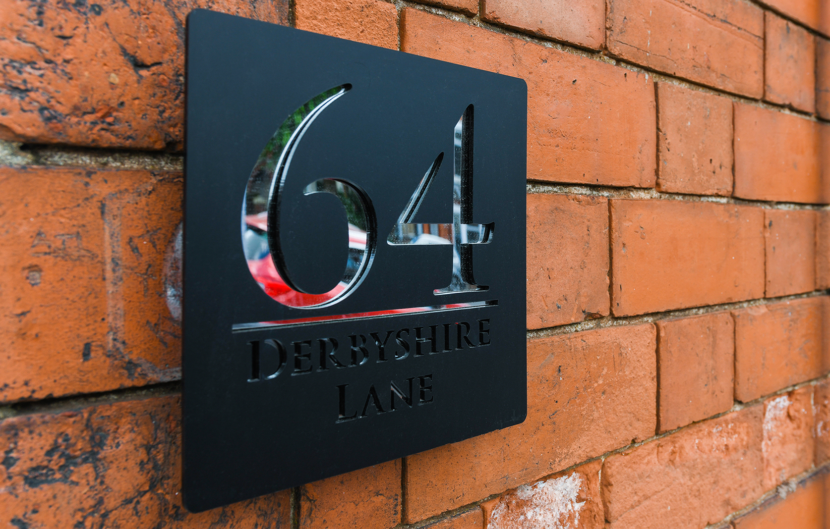 64 Derbyshire Lane property plaque at 64 Derbyshire Lane