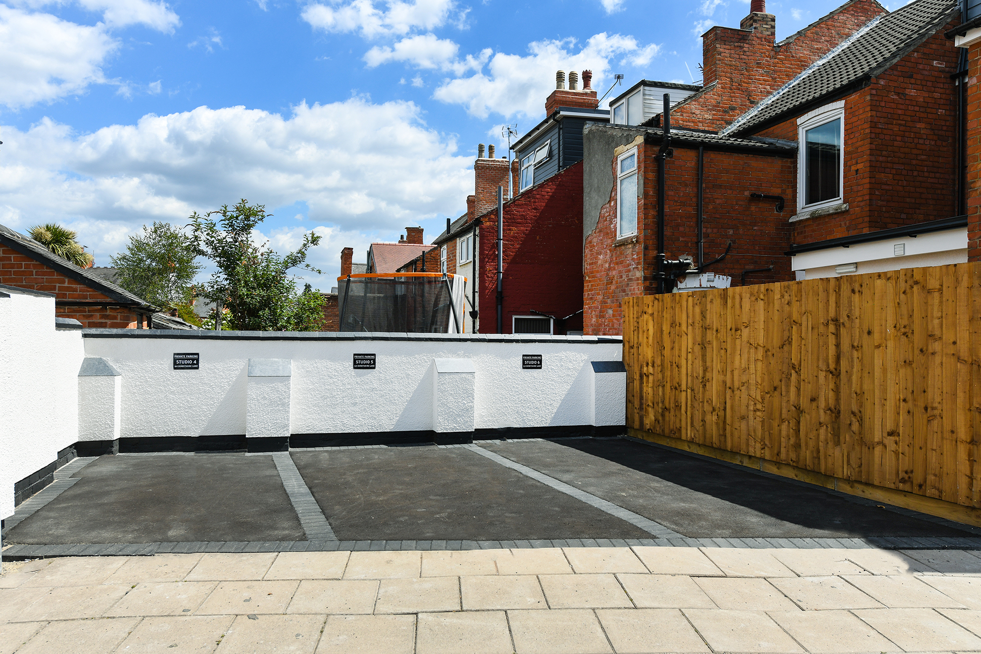 Exterior parking court at 64 Derbyshire Lane