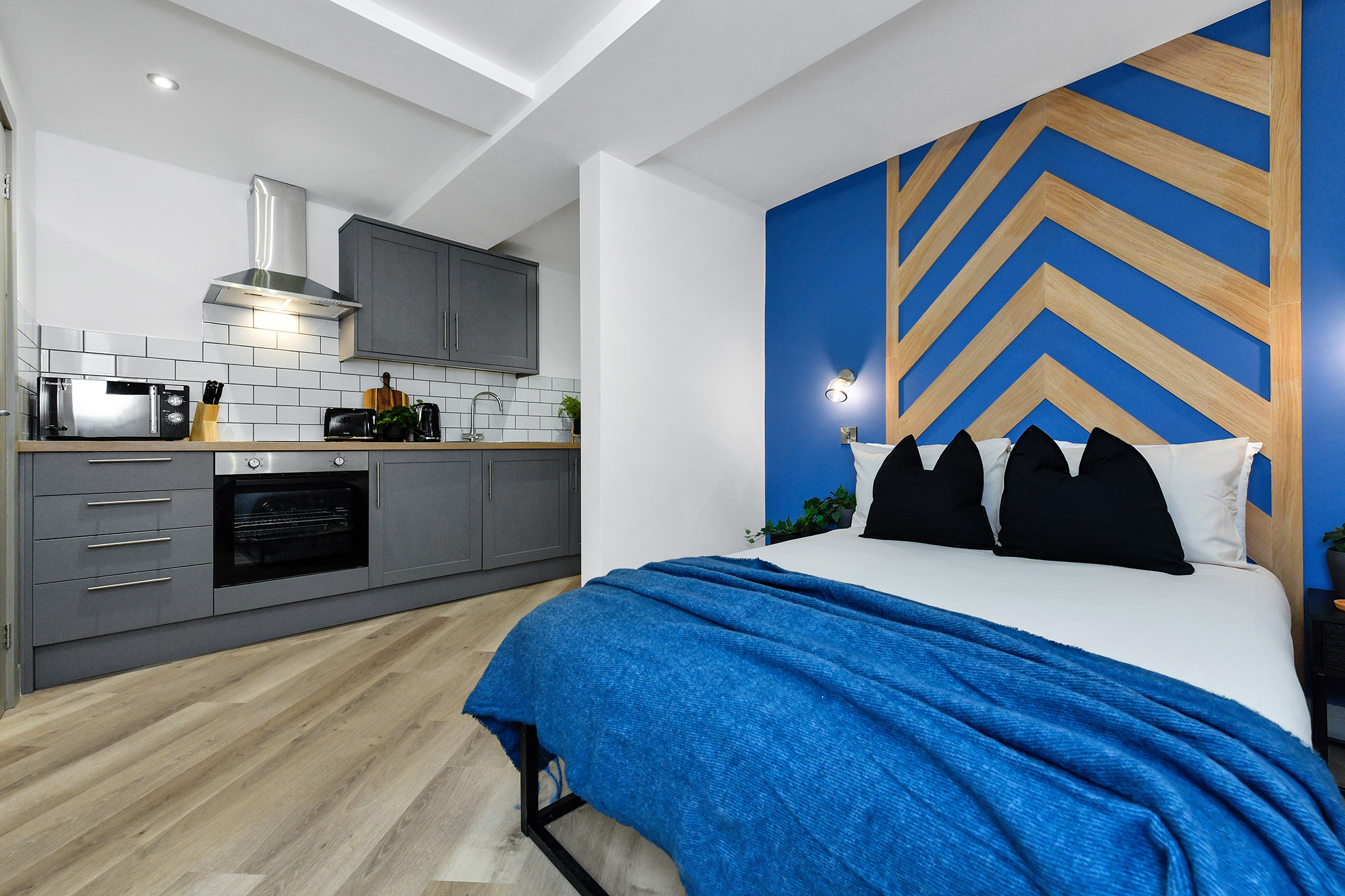 Bedroom and kitchenette at 64 Derbyshire Lane