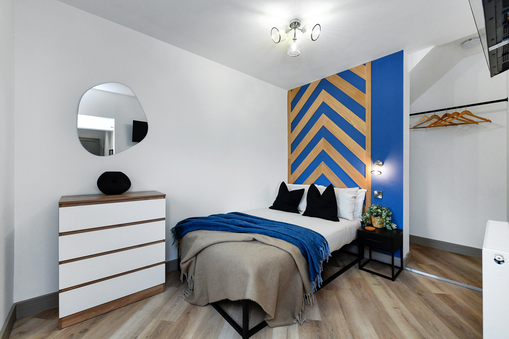 Blue and timber detailing in a Derbyshire Lane bedroom